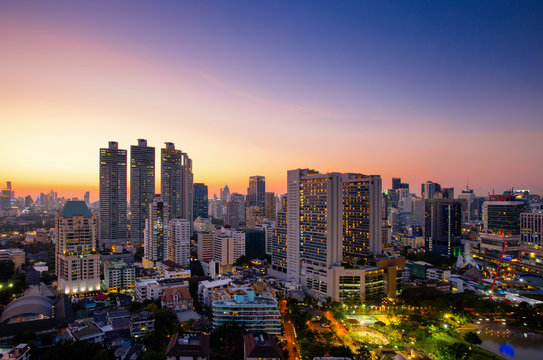 View of Bangkok modern office buildings, condominium in Bangkok city downtown with sunset sky ,Bangkok is the most populated city in Southeast Asia. Bangkok , Thailand