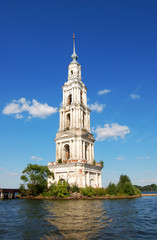 Fototapeta na wymiar The bell tower of the flooded monastery on the Volga river. Kalyazin, Russia