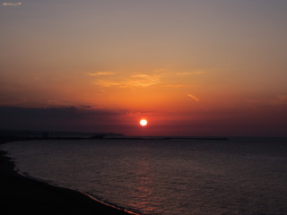 Obraz premium 鳥取砂丘から望む夕日_遠景