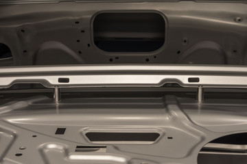 Obraz na płótnie Canvas Metal parts of a car in automotive production