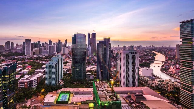 Manila, Philippines, Time Lapse View of Makati City and Pasig River at Sunset
