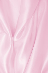 Obraz premium Gładka elegancka różowa jedwabna lub satynowa tekstura jako tło wesele. Luksusowy projekt tła walentynki