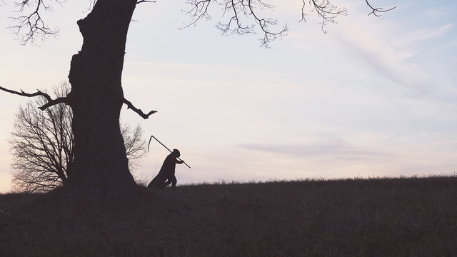 Grim Reaper Sunset Silhouette. Concept Of Death