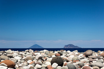 Beautiful sight from the rocky beach of Salina, a little sicilian island