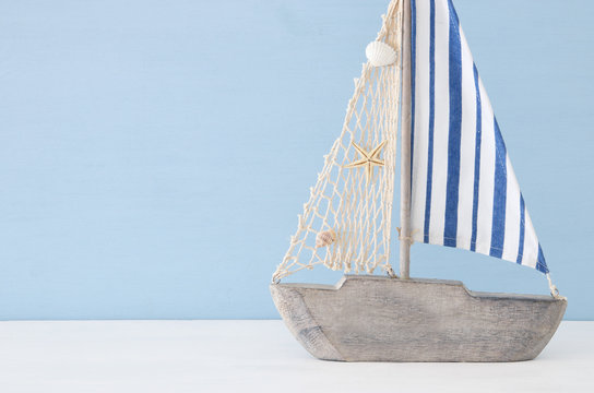 nautical concept with sail boat over blue background.