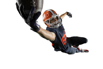 Isolated American football player catches the ball and fly in white background