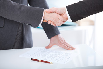 Business handshake. Business handshake and business people concept.