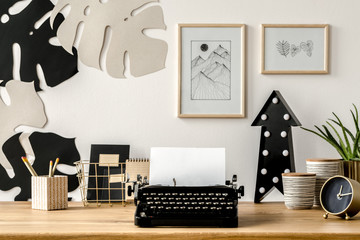 Black typewriter on desk