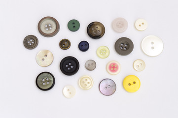 group of colored buttons on white background