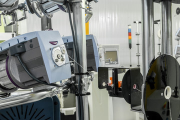 weaving loom at a textile factory, closeup. industrial fabric production line