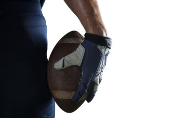 Isolated American football players hand with ball in white background