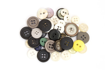 group of colored buttons on white background