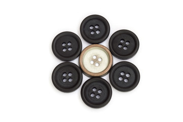 Round flower formed by colored buttons