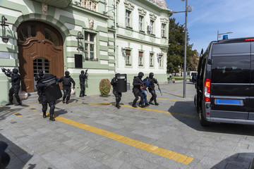Special police unit entering the building and arresting the terrorists