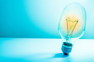 abstract background light bulb on blue background