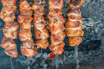 top view of grilled meat on bbq mangal outdoors.