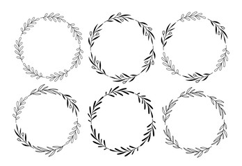 Set of hand drawn vector round floral wreaths