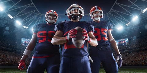 American football players in professional sport stadium © Alex