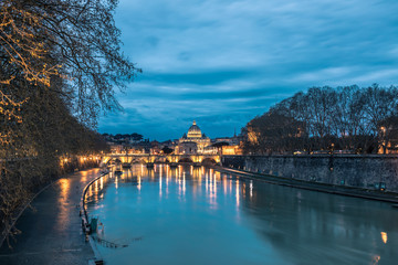 Obraz premium St. Peter's Basilica and Ponte Sant Angelo, Vatican City, Italy by night