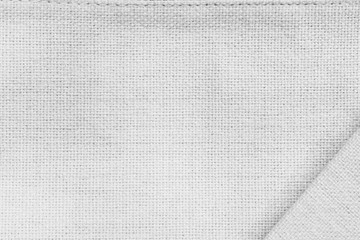 Linen texture background. Surface of white textile fabric.