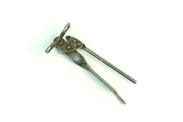 Old can opener. Photo on white background.