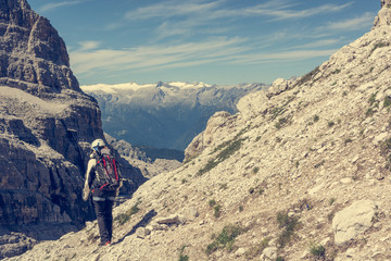 Fototapeta premium Hiker on a mountain trail.