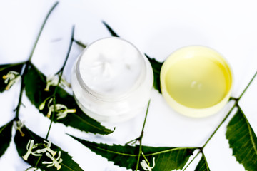 Close up of cream of Neem,Nim, Indian Iilac or Azadirachta indica with the leaves of neem tree...