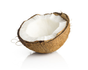 One coconut half isolated on white background cracked brown fibrous shell with milk meat.