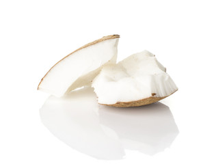 Two coconut broken pieces isolated on white background milk meat.