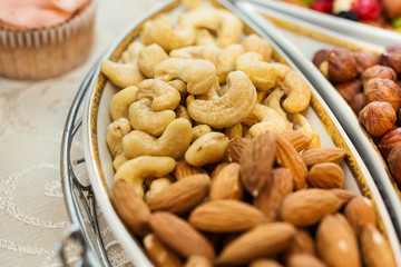  bowl with mixed nuts such as almonds, hazelnuts and cashews. Healthy food and snack