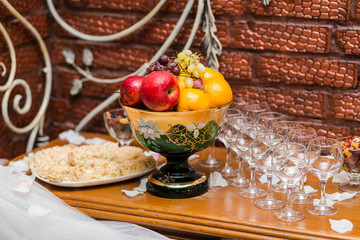 empty glasses for champagne on a buffet table