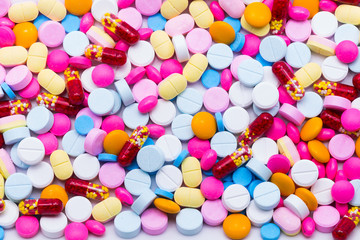 Many different colorful medication and pills from above