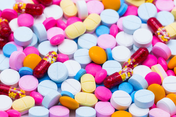 Fototapeta na wymiar Many different colorful medication and pills from above