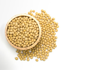 soybeans in the wooden bowl isolated on white background. Have a copy space for text.