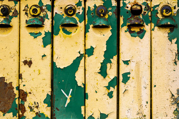 Old weathered iron mailboxes