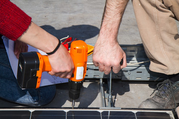 skilled technicians working on a photovoltaic plant
