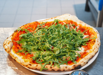 Home made Vegetarian pizza with arugula