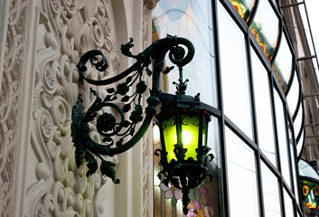Decorative street lamp with green light © dizfoto1973