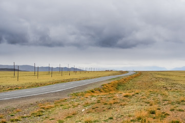 Fototapeta premium The road in the steppe. Altai Mountains
