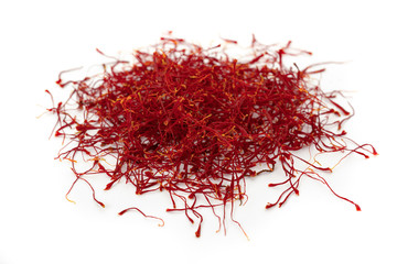 dried saffron, obtained from crocus flower, isolated on white, close up 
