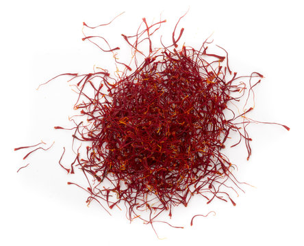 dried saffron, obtained from crocus flower, isolated on white, close up 
