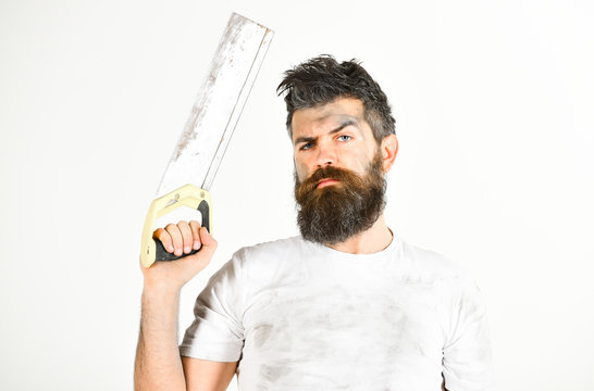 Builder, worker, carpenter, handyman holds saw or hacksaw,