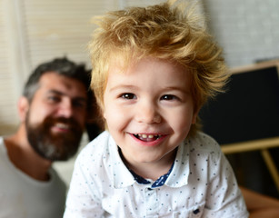 Family and childhood concept. Boy spends fun time in playroom.