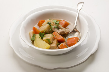 delicious home made irish stew in a white bowl