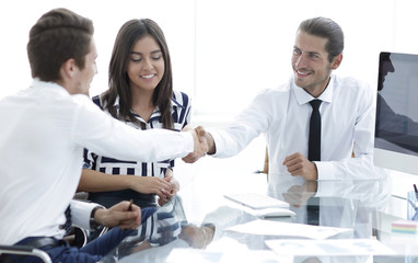 Business people shaking hands, finishing up a meeting