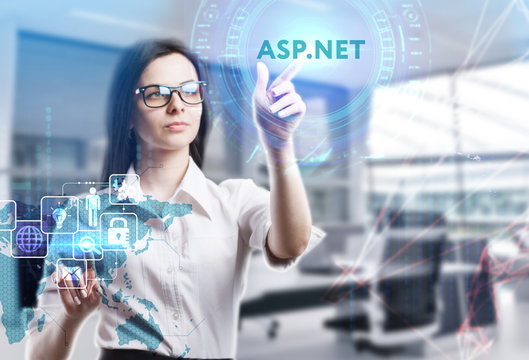 The concept of business, technology, the Internet and the network. A young entrepreneur working on a virtual screen of the future and sees the inscription: ASP.NET