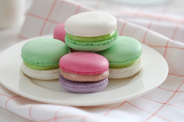 A plate of macarons on a napkin