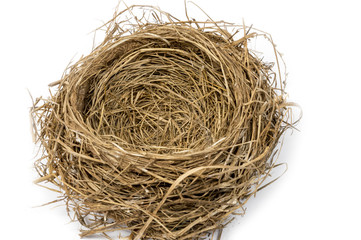 Horizontal shot of an Empty Bird's Nest on a White Background With Shadow.