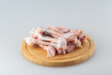  raw chicken bones on white background