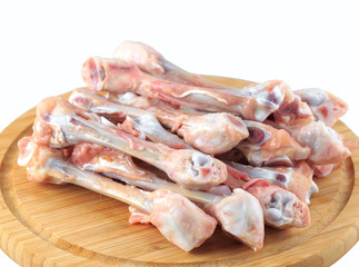  raw chicken bones on white background